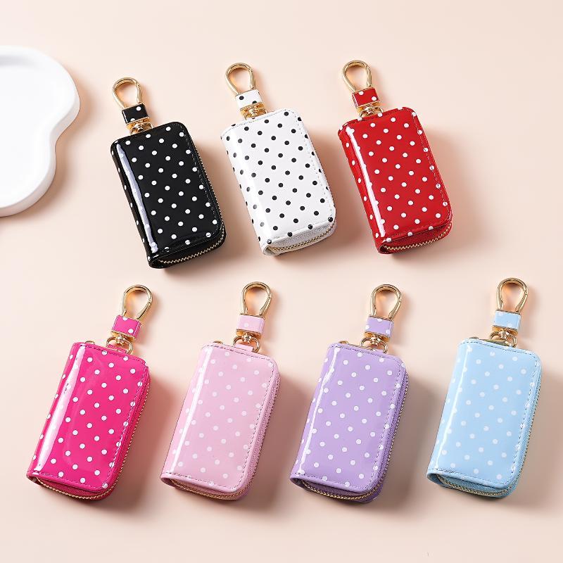 水玉模様の光沢のあるパテントレザーキーポーチゴールデンジッパ - Men Accessories In Store のレビューと価格